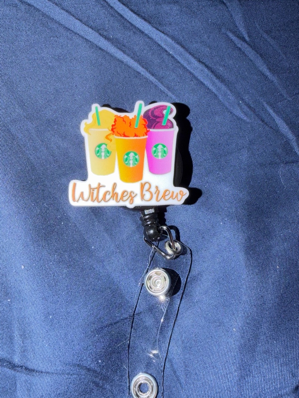 Witches Brew Badge Reel - Orange Yellow Purple